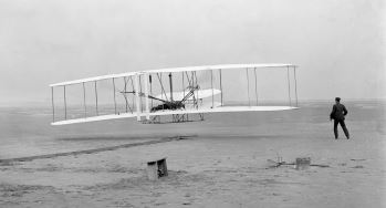 Wright Flyer by John T. Daniels is licensed under Public domain